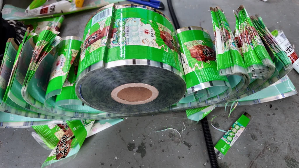 Green PP woven bags before pelletizing