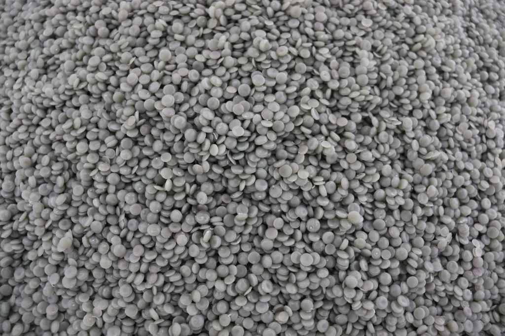 Grey recycled pellets after pelletizing